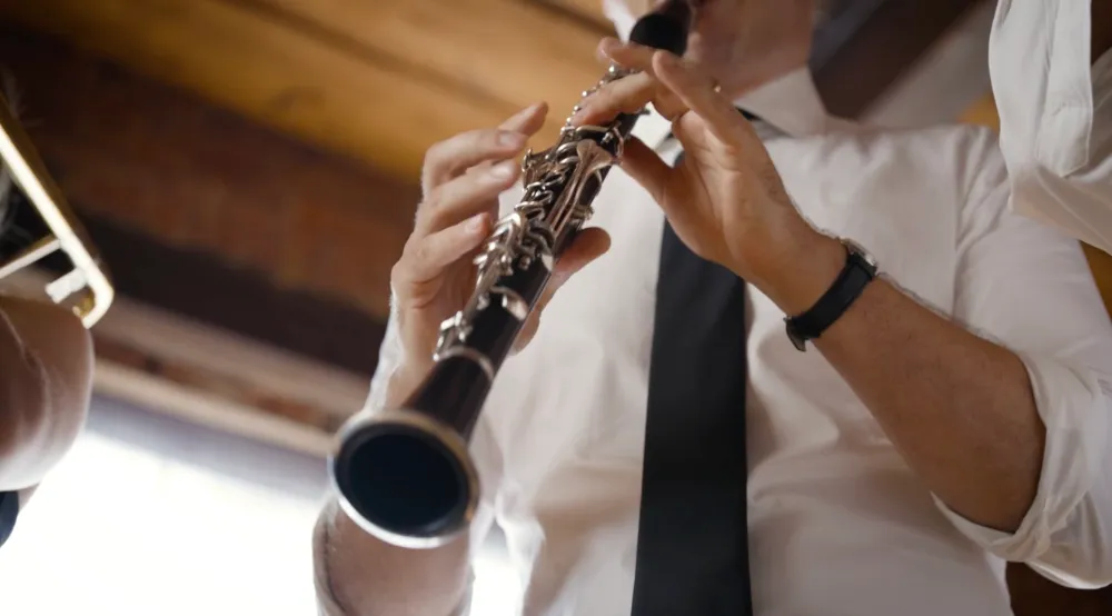 Closeup of Sasha playing clarinet